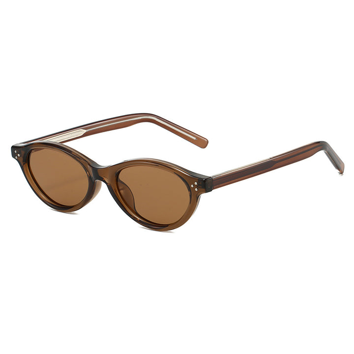 Dame Cat-Eye solbriller med elegant, transparent ramme og UV400-beskyttelse Skanto