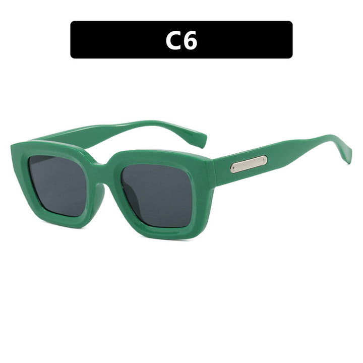 Dame kvadratisk solbrille med gjennomsiktig ramme og brune glass Skanto