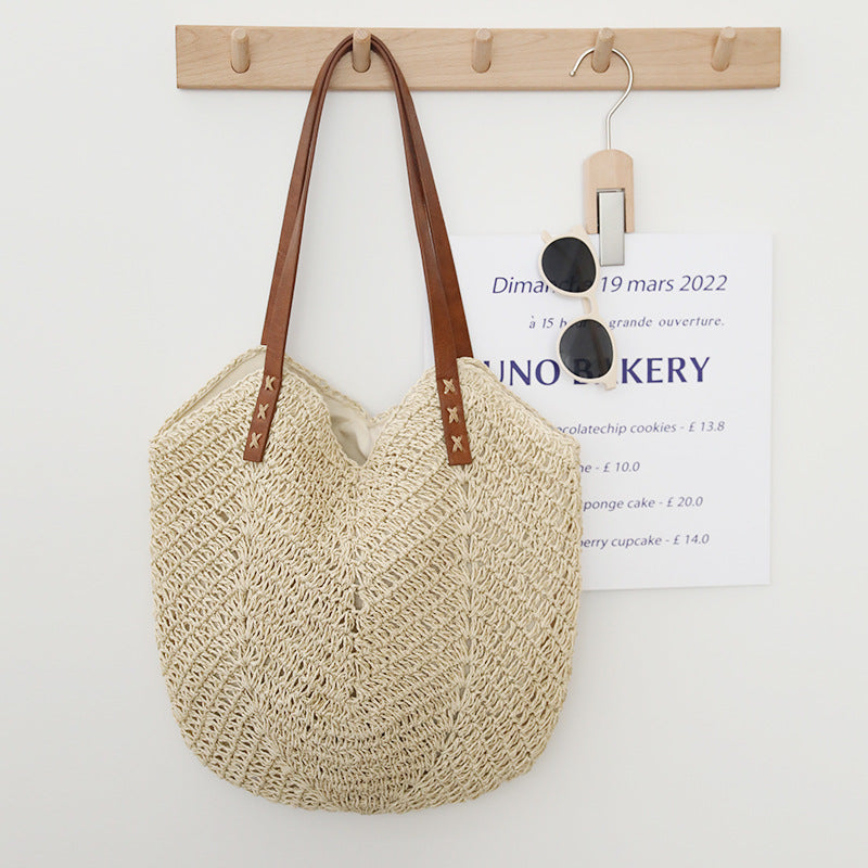 Braided basket bag with sturdy leather handles Skanto