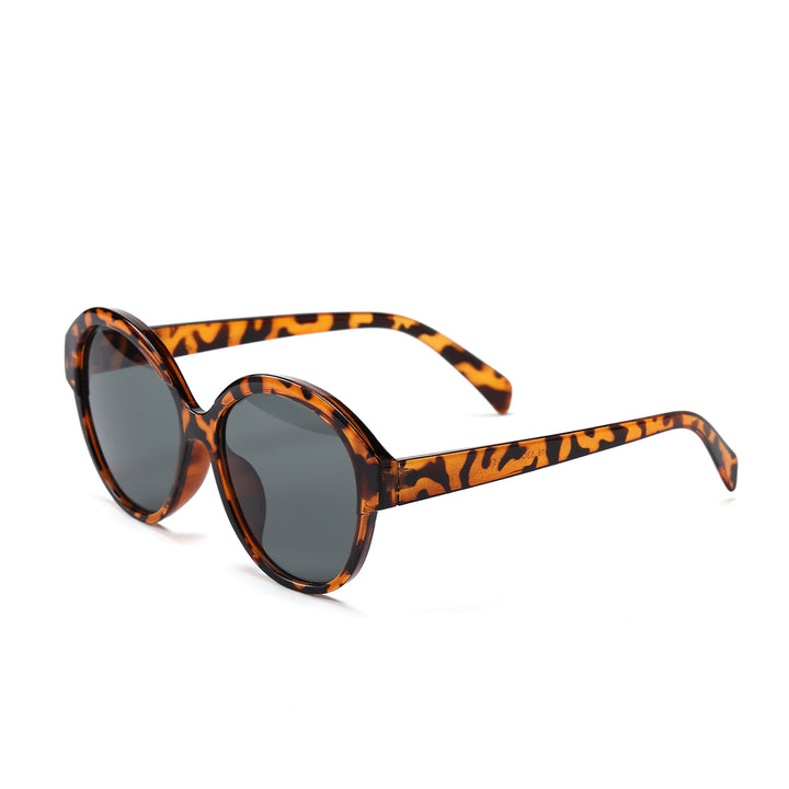 Dame rund moteriktig solbrille med iøynefallende leopardmønster Skanto