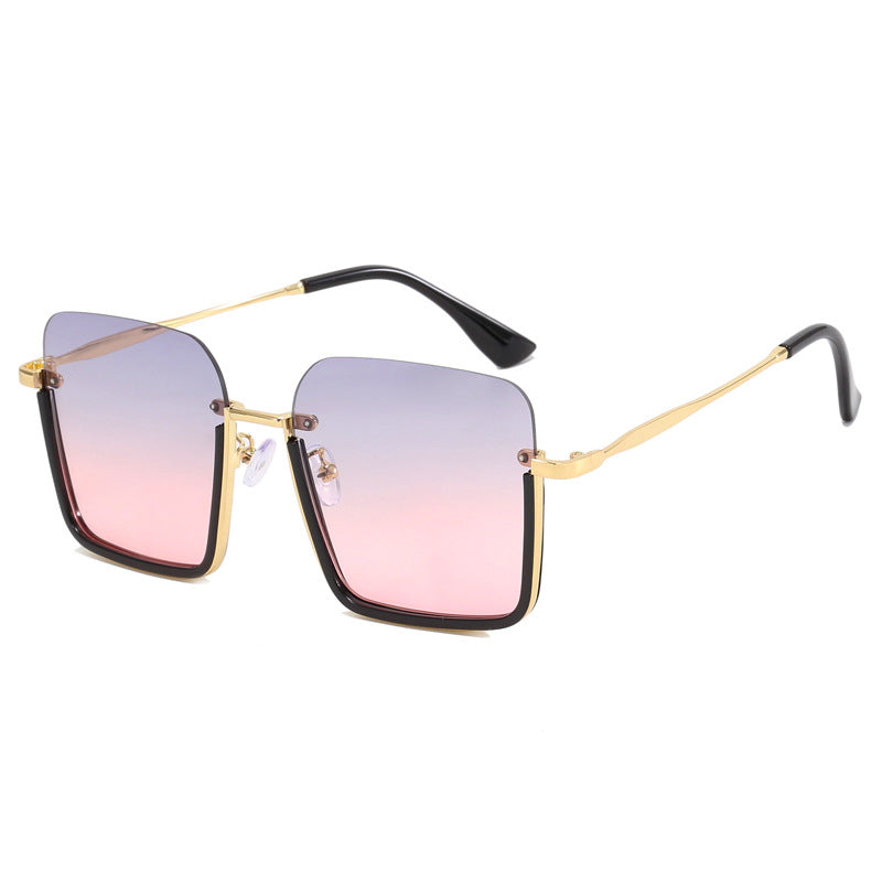 Dame oversized solbrille med elegant geometrisk ramme Skanto