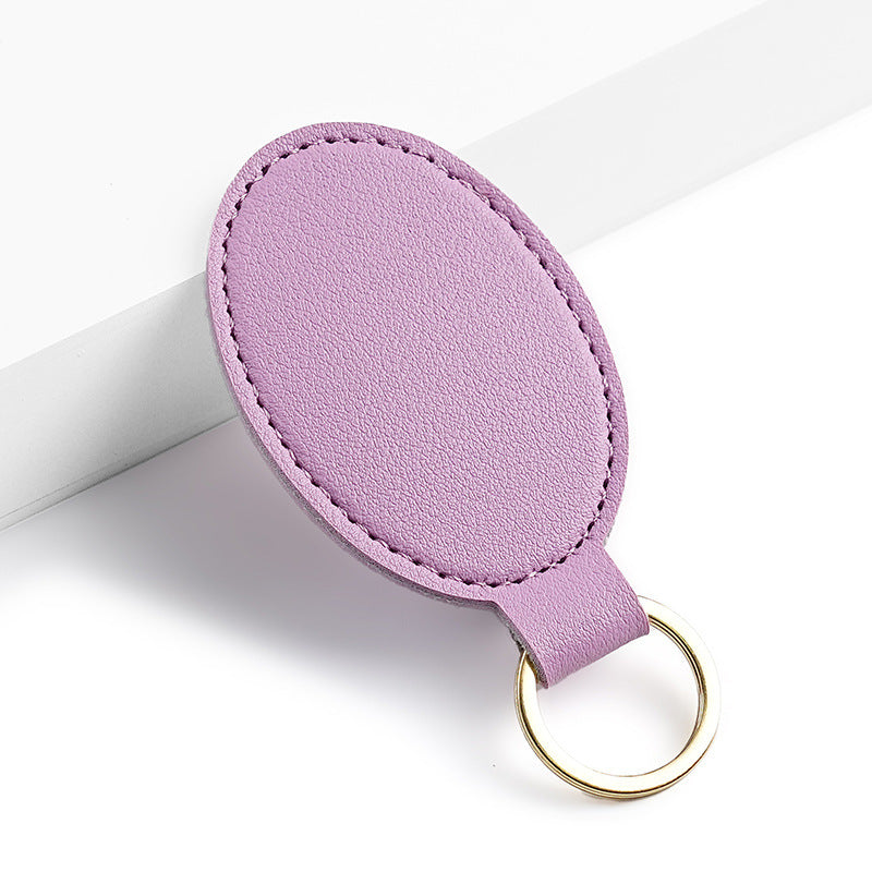 Unisex nøkkelring i høy kvalitet av kunstskinn med stiløs design Skanto