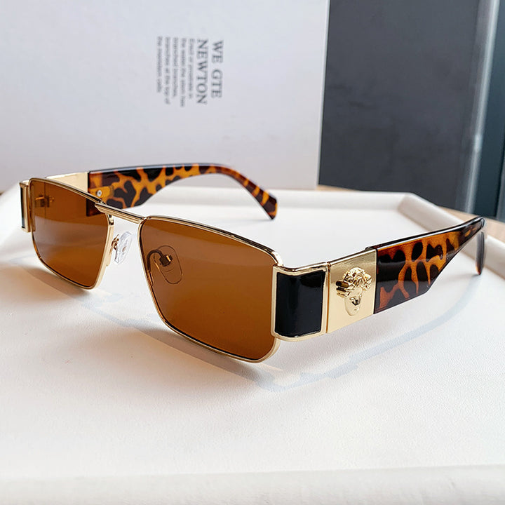 Dame Designer-solbrille med luksuriøs inn ramme og trendy snitt Skanto