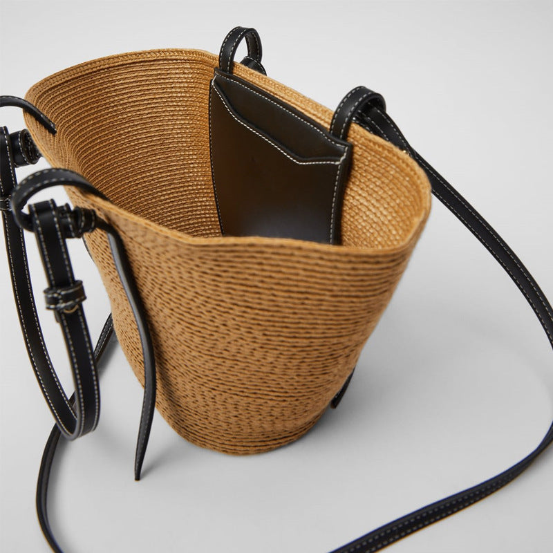 Spacious basket bag with elegant leather details Skanto