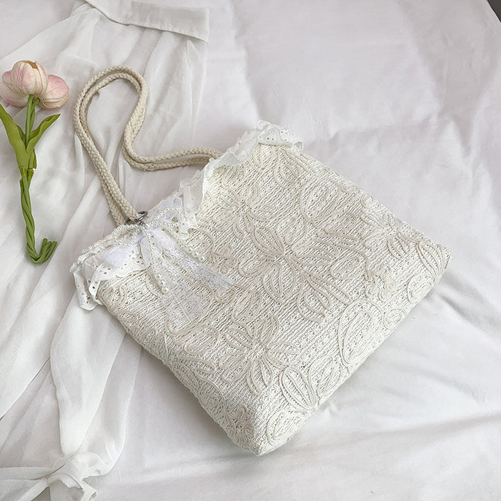 Elegant og Lettvektig Håndveske med Spisskant Skanto
