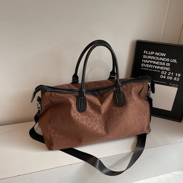 Elegant Reisetasche med Innovativt Leopardmønster Skanto