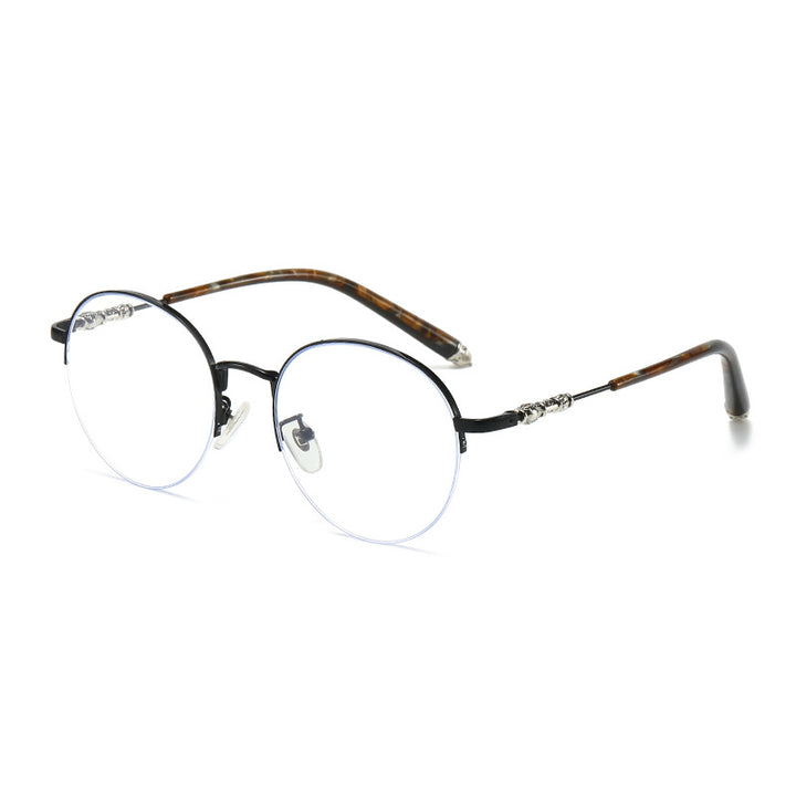 Dame rund solbrille med elegant metallramme og komfortable nesepads Skanto