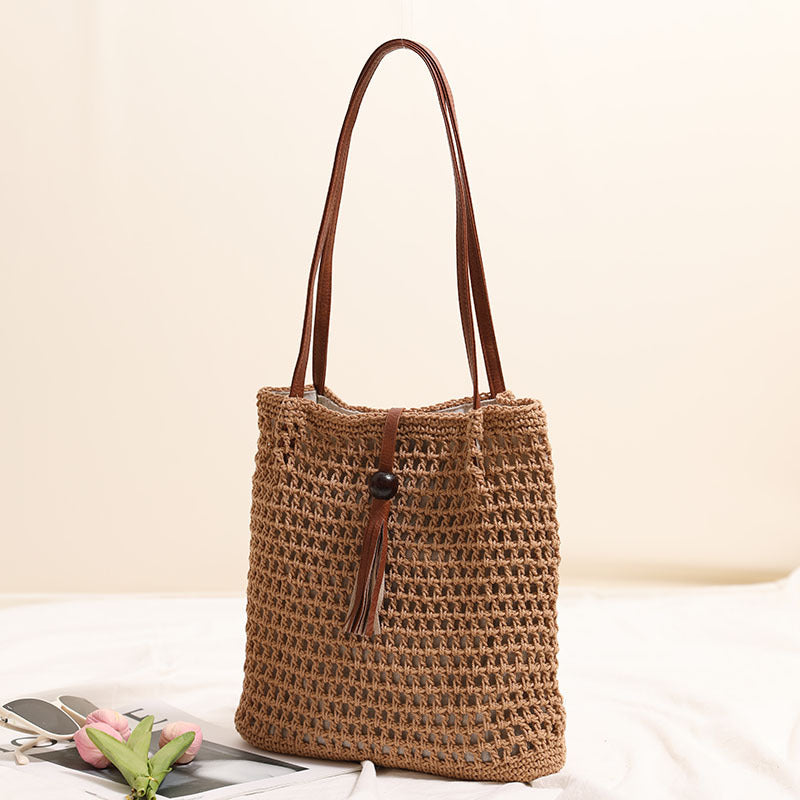 Hand-knotted basket bag with elegant leather handle Skanto