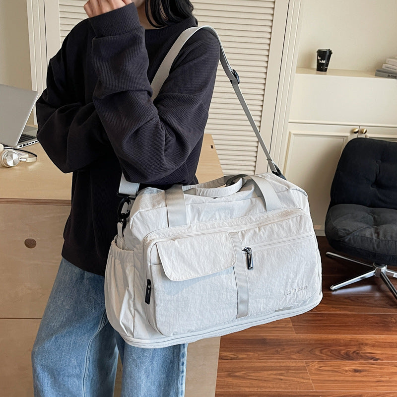 Dame Sporty Reisetask med mye lagringsplass og funksjonelt design Skanto