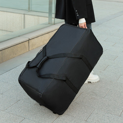 Romslig reiseveske med robust design og praktiske hjul Skanto
