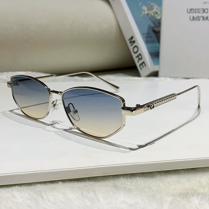 Women's elegant sunglasses with sparkling metal frame Skanto