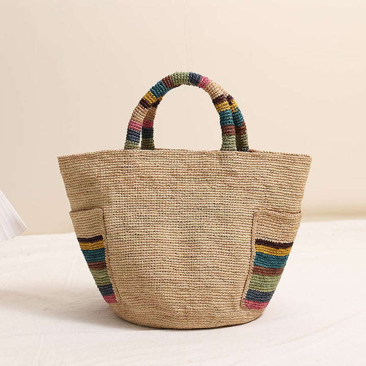 Handmade basket bag with colorful stripe accents Skanto