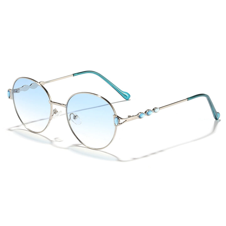 Dame rund solbrille med elegant metallramme og speilvendte glass Skanto