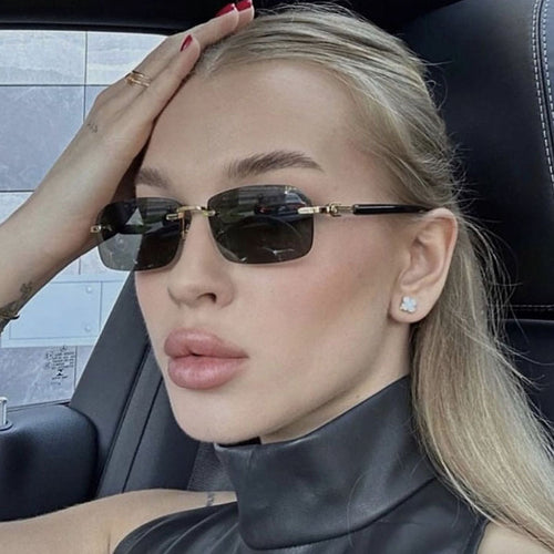 Women's sunglasses with elegant metal frame and stylish wood details Skanto