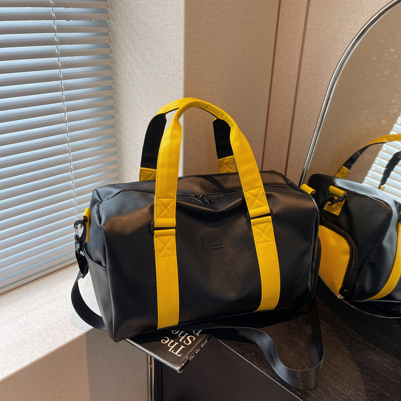 Sporty duffel bag with durable water-repellent material and versatile carrying options Skanto