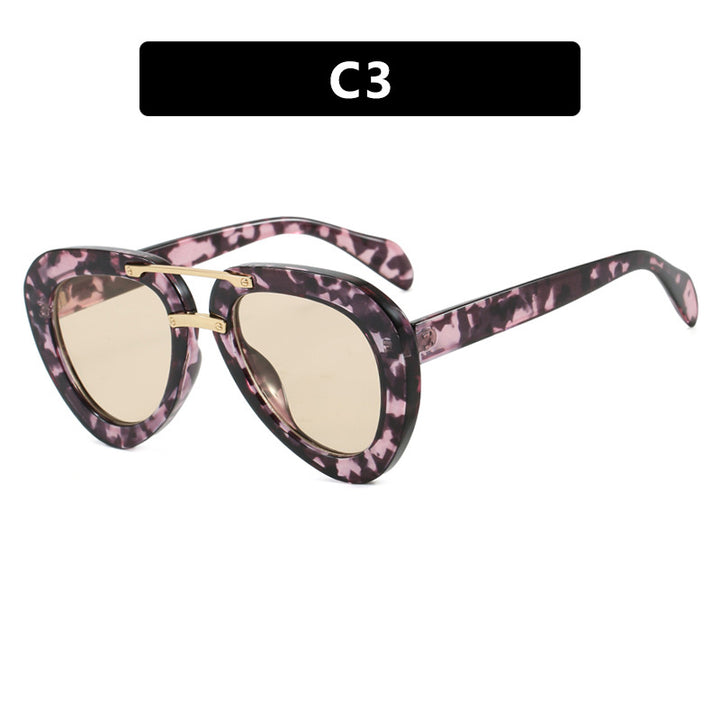 Women's extravagant sunglasses in modern heart design Skanto
