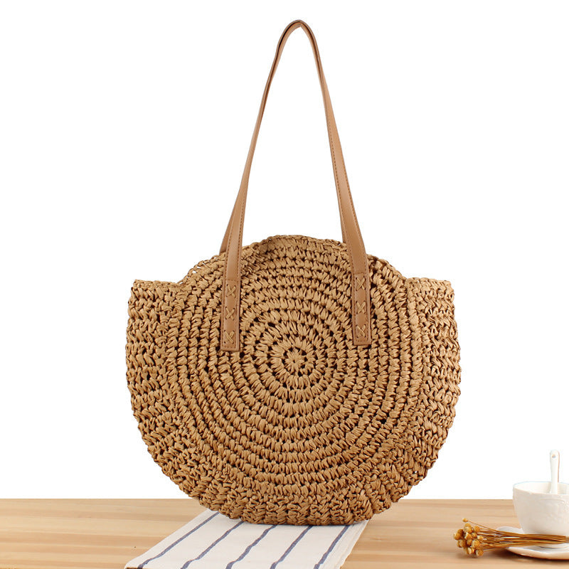 Round straw bag with leather handle Skanto