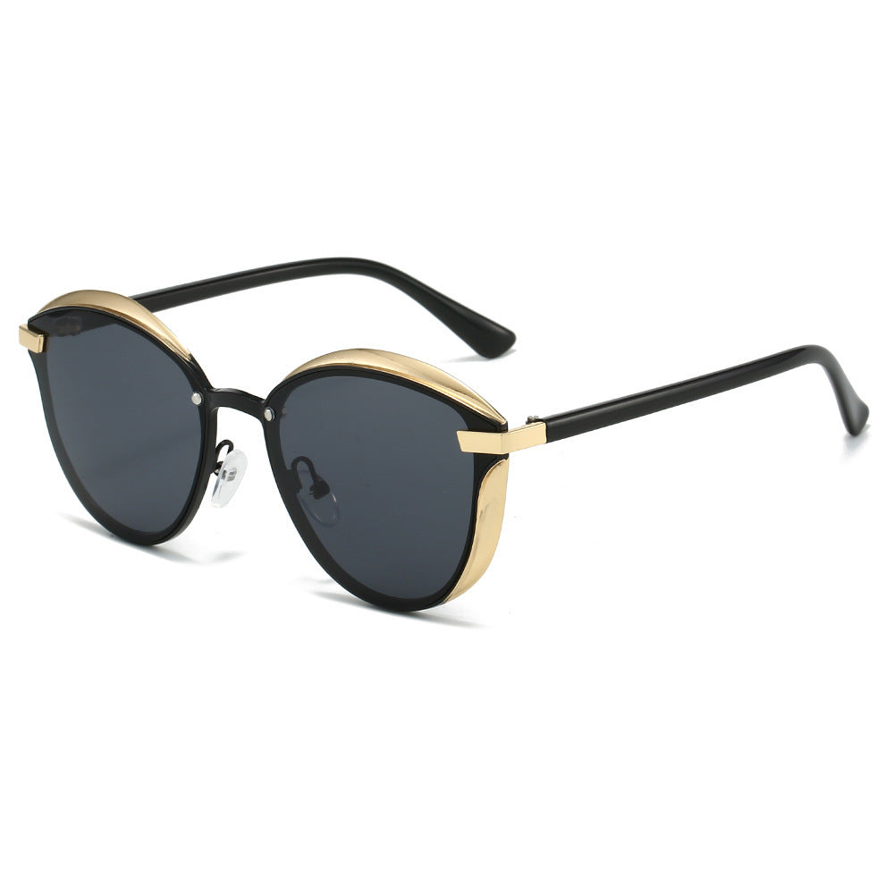 Dame solbrille med luksuriøs metallramme og harmonisk kontur Skanto