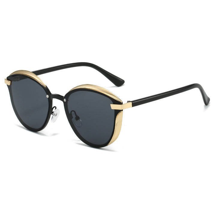 Dame solbrille med luksuriøs metallramme og harmonisk kontur Skanto