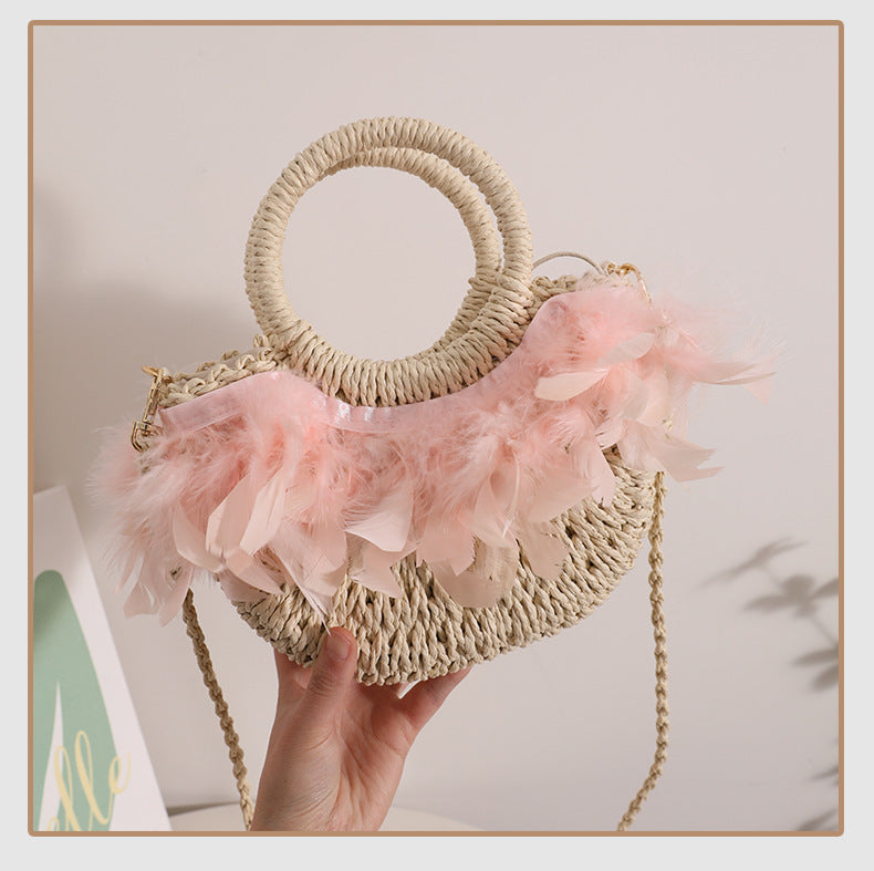 Elegant basket bag with delicate feather details Skanto