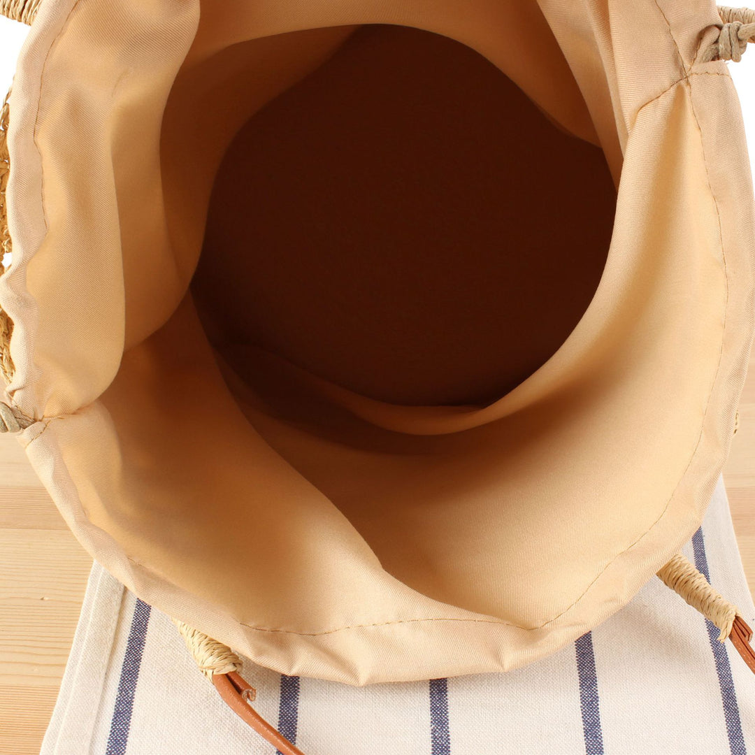 Hand-knotted beach bag with floral details Skanto