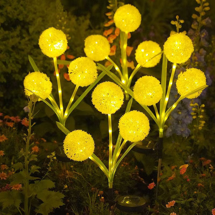 Løvetann-inspirerte solenergi hage-spyd med integrert solcellepanel og doble blomsterkuler Skanto