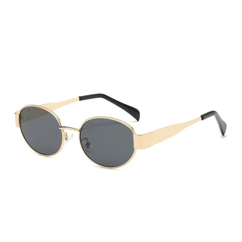 Dame moteriktig solbrille i elegant oval design Skanto