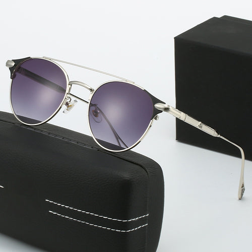 Dame rund Vintage-solbrille med høykvalitets metallramme og robust design Skanto