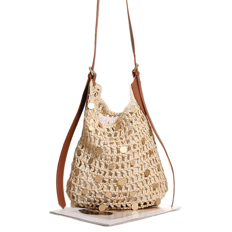 Hand-knotted shoulder bag with metal details Skanto