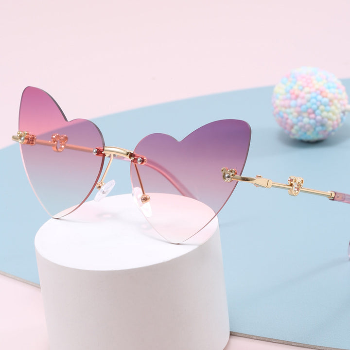 Damer hjerteformet solbrille med dekorert ramme Skanto