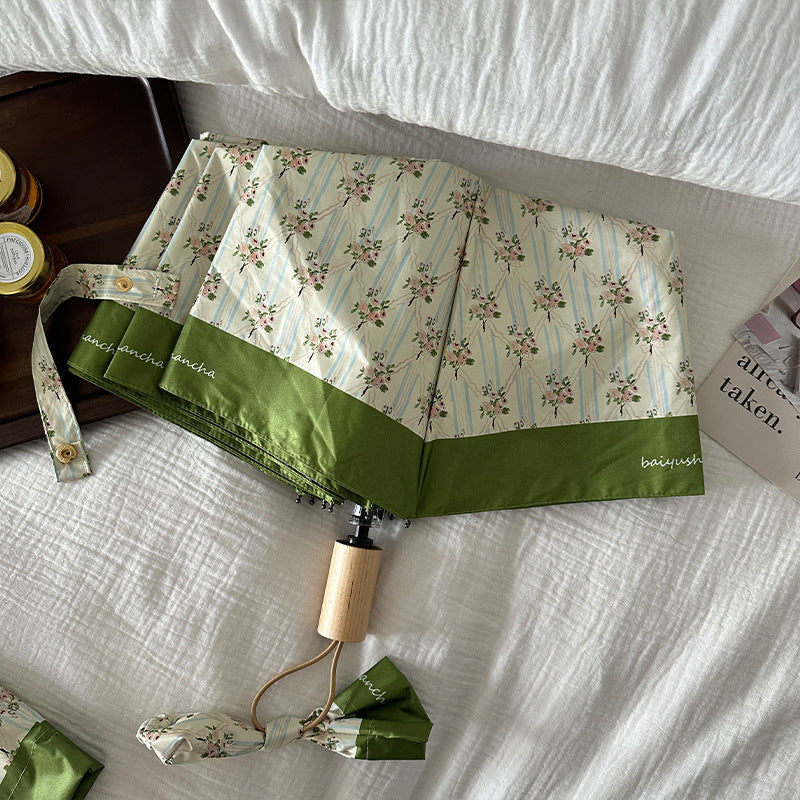 Dame elegant felle paraply med blomsterdesign Skanto