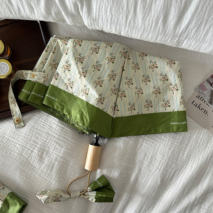 Dame elegant felle paraply med blomsterdesign Skanto