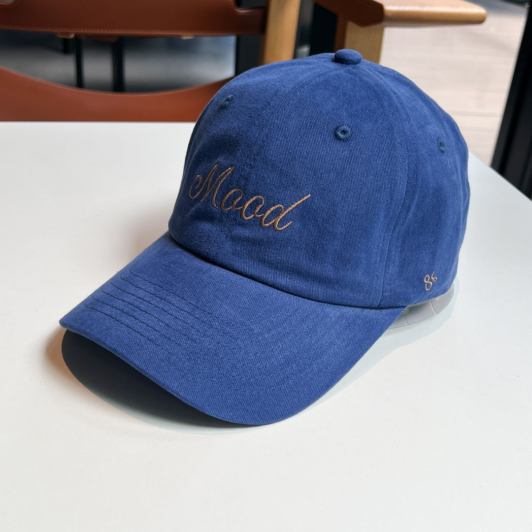 Kvinnenes broderte statement caps Skanto