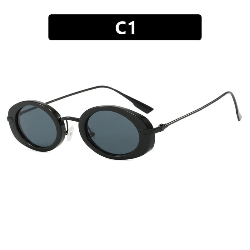Dame moteriktig solbrille i elegant ovalt design Skanto