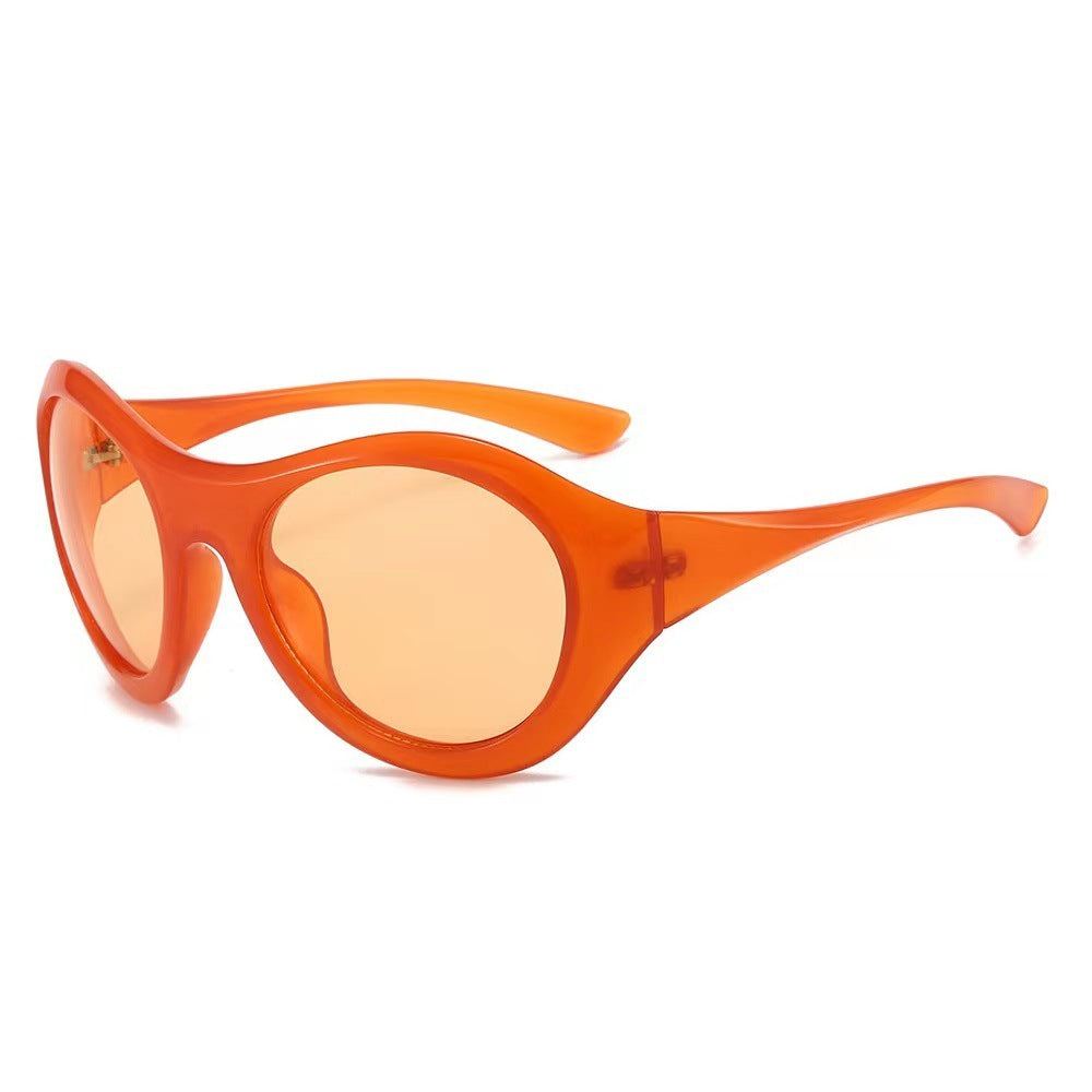 Dame Mote Oval Solbrille med gjennomsiktig ramme Skanto