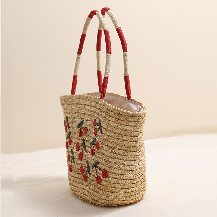 Handmade basket bag with vibrant floral embroidery design Skanto