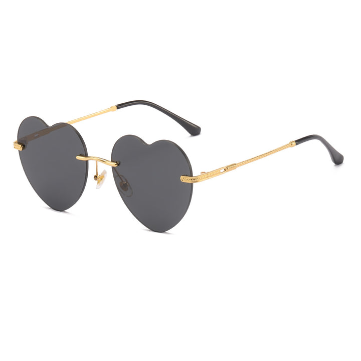Dame hjerteformet solbrille med speilglass og gullramme Skanto