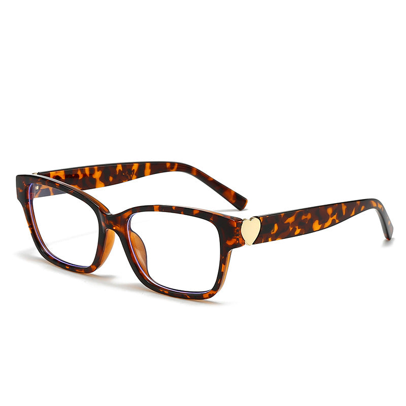 Dame moterik kvadratisk solbrille med hjerte-senter Skanto