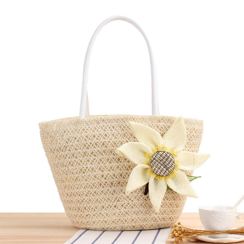 Handbag with floral appliqué in natural material Skanto