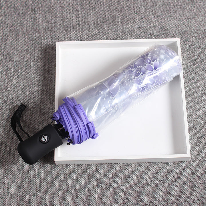 Damer elegant og bærbar paraply med blomsterdesign Skanto