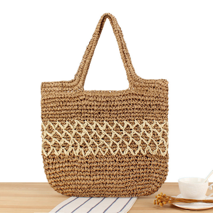 Håndlaget bast crossbody bag med florale detaljer Skanto