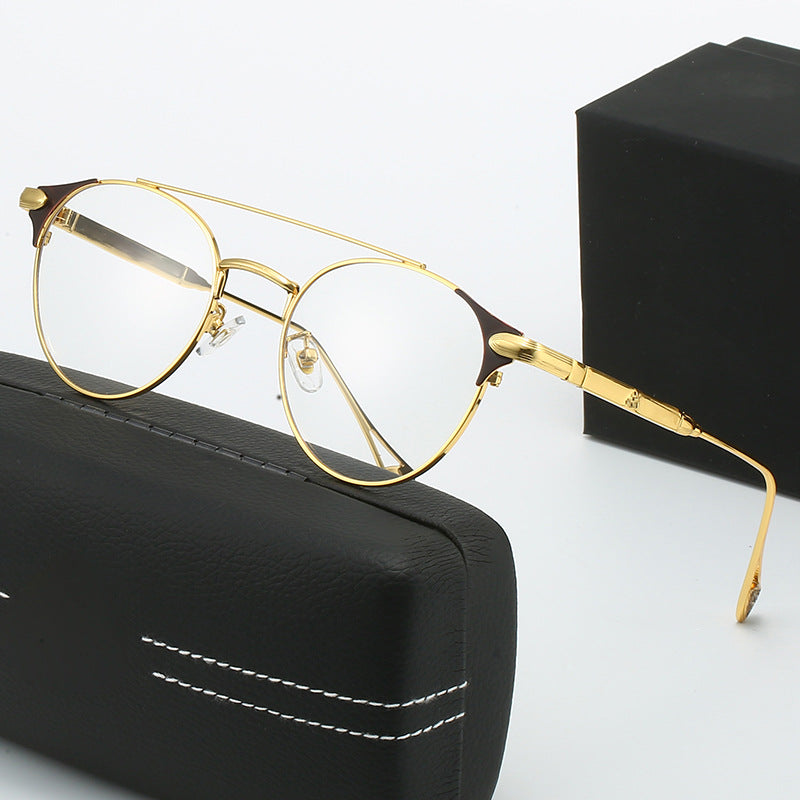 Dame rund Vintage-solbrille med høykvalitets metallramme og robust design Skanto