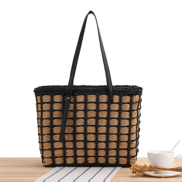Hand-knotted tote bag in natural material with elegant leather handles Skanto