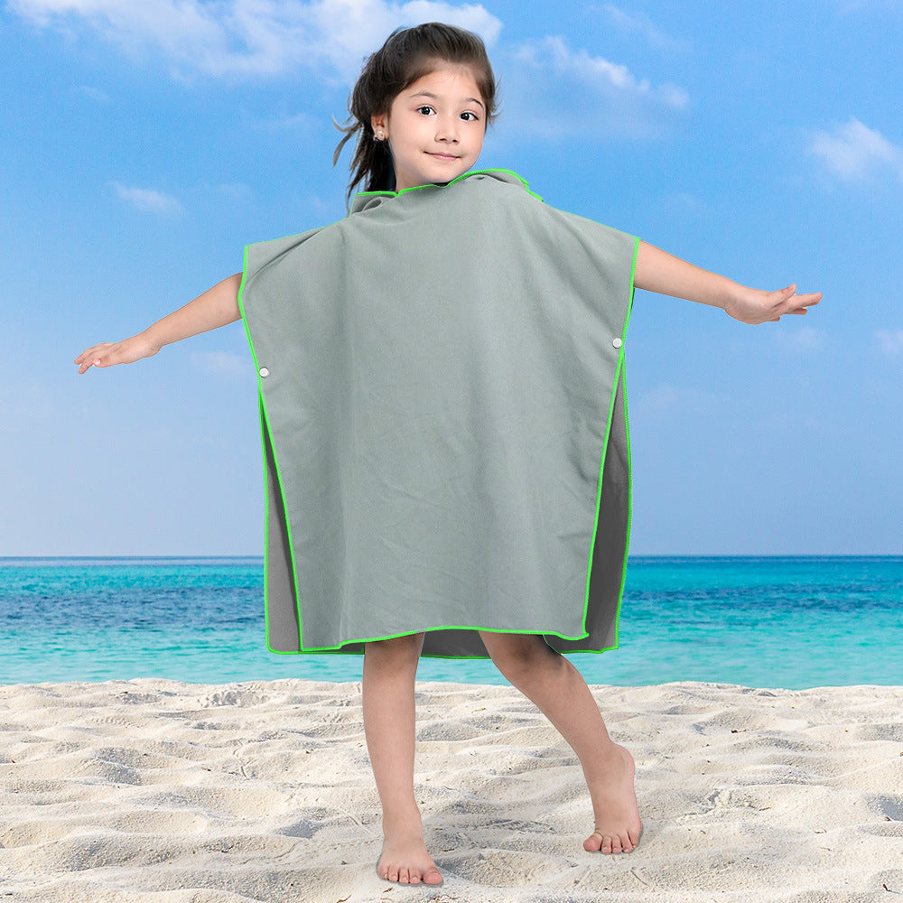 Jente badeponcho Skanto