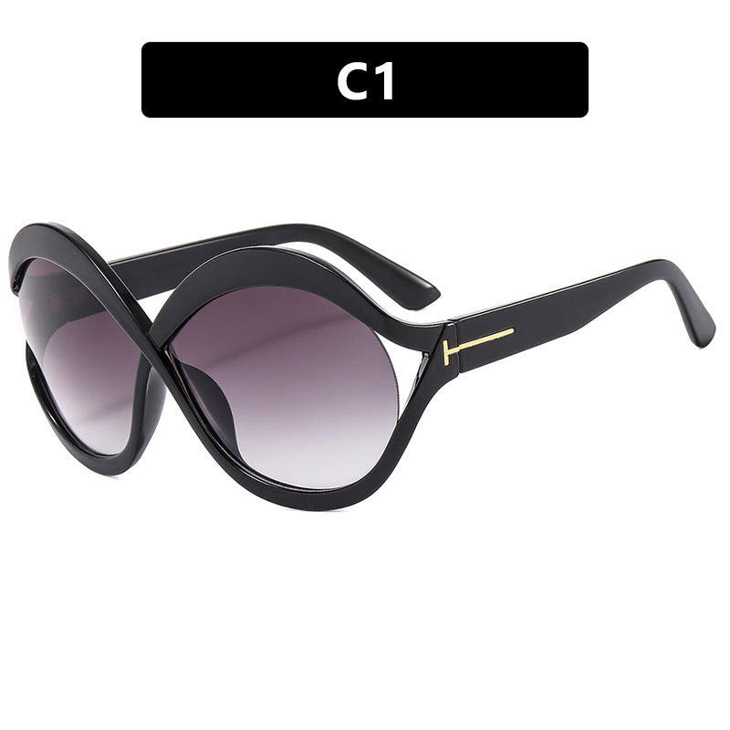 Dame ekstravagant formet solbrille Skanto