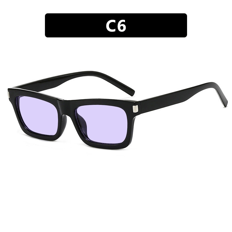 Dame kvadratisk solbrille med transparente linser og stillegant design Skanto