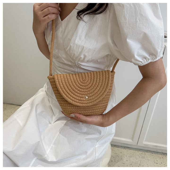 Håndknyttede mini-veske med buet design Skanto