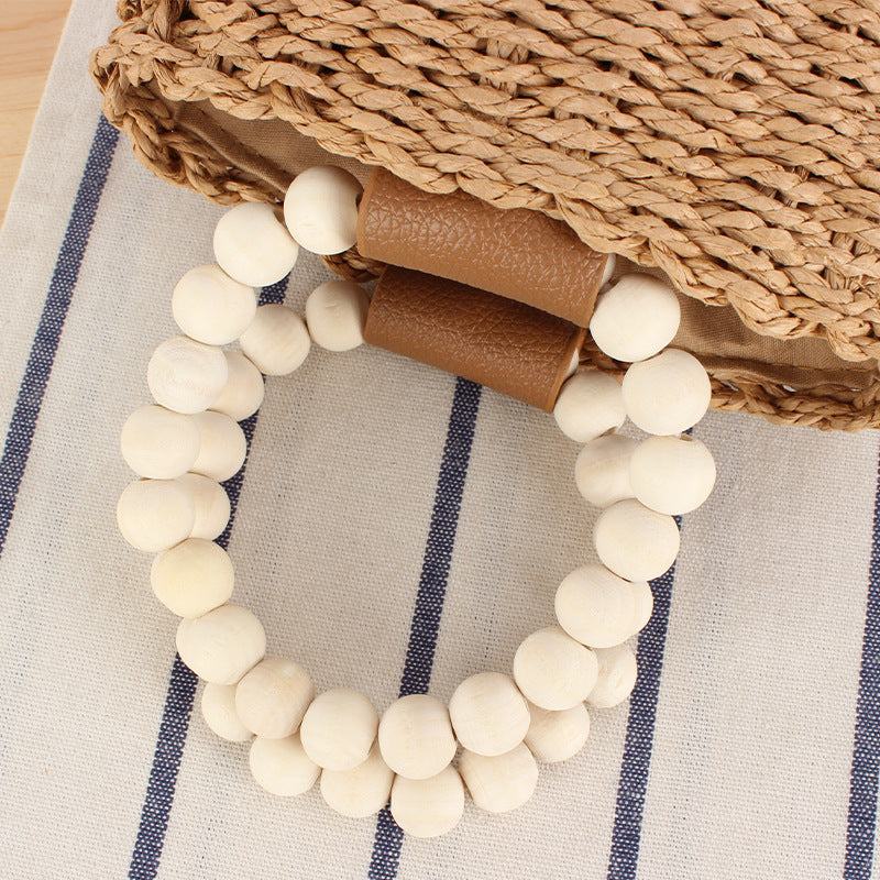 Trendy handbag with wooden bead handle Skanto