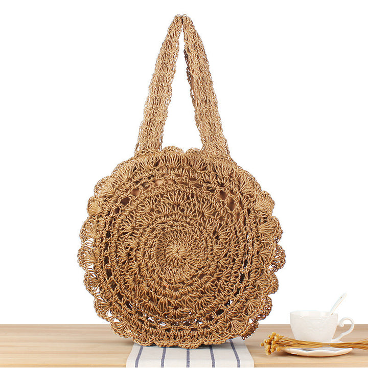 Hand-knotted beach bag with artistic round design Skanto