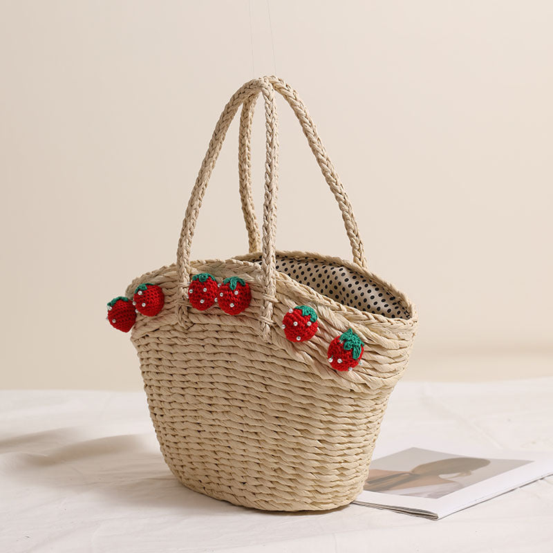 Handmade basket bag with playful strawberry motif Skanto